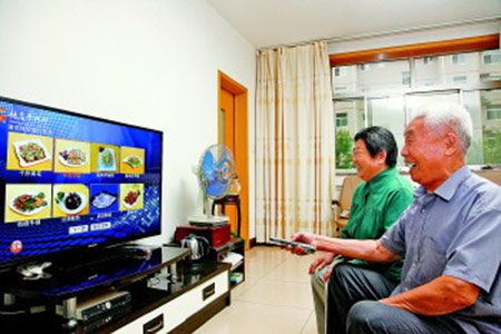 居民在家中按遥控器就能在电视上点餐.jpg